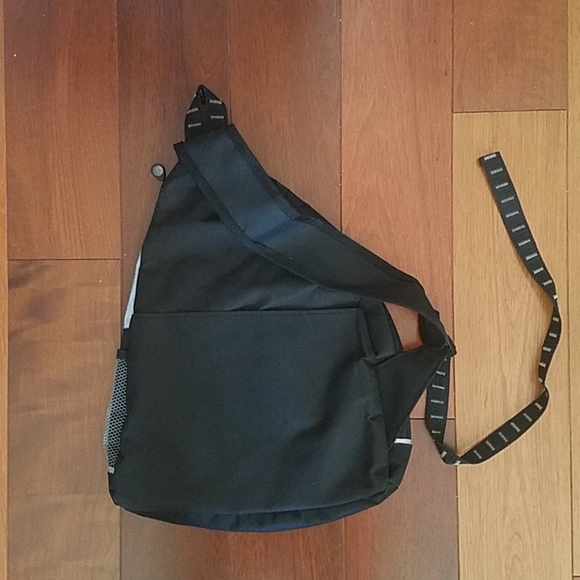 NWOT Left one-shoulder black backpack - Picture 2 of 3